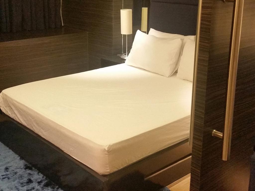 Mandaluyong Shang Luxury Suites חדר תמונה